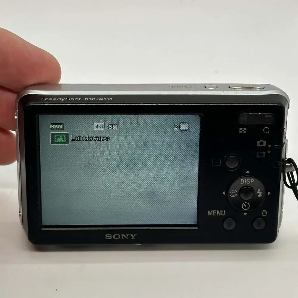 Sony Cyber-Shot DSC-W310 Digital Camera 12.1MP 4X Optical Zoom Lens Cover Sticks